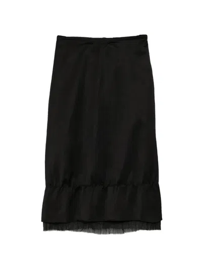 Faldas midi de raso negras