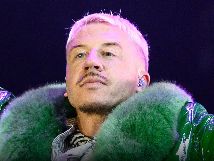 El-cantante-Macklemore-enfrenta-llamados-para-que-lo-retiren-de.jpg